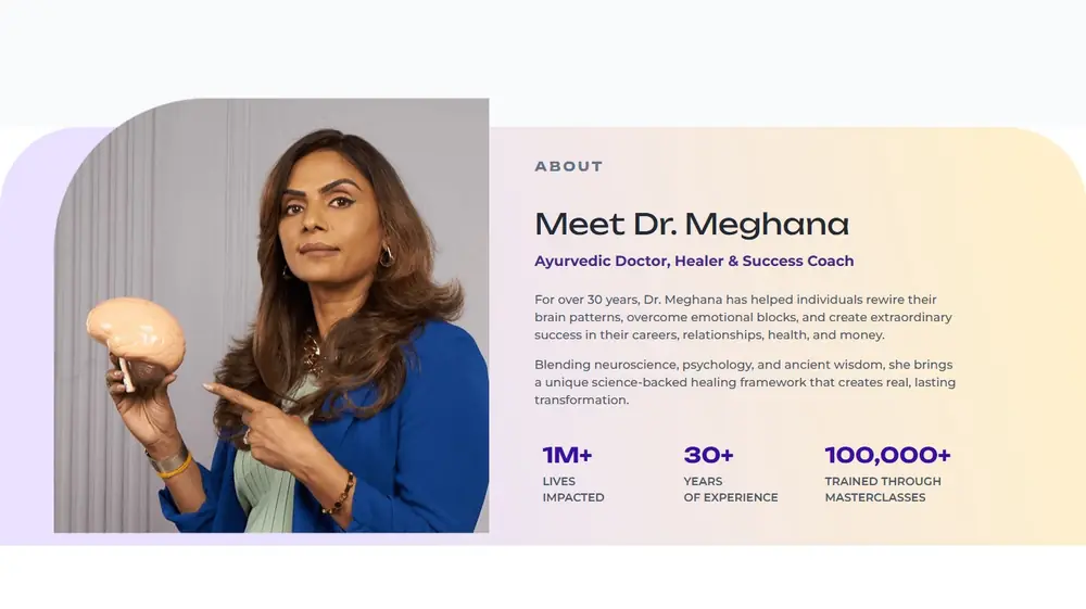 Dr. Meghana Dikshit holding a brain model in the Meet Dr. Meghana section of her website